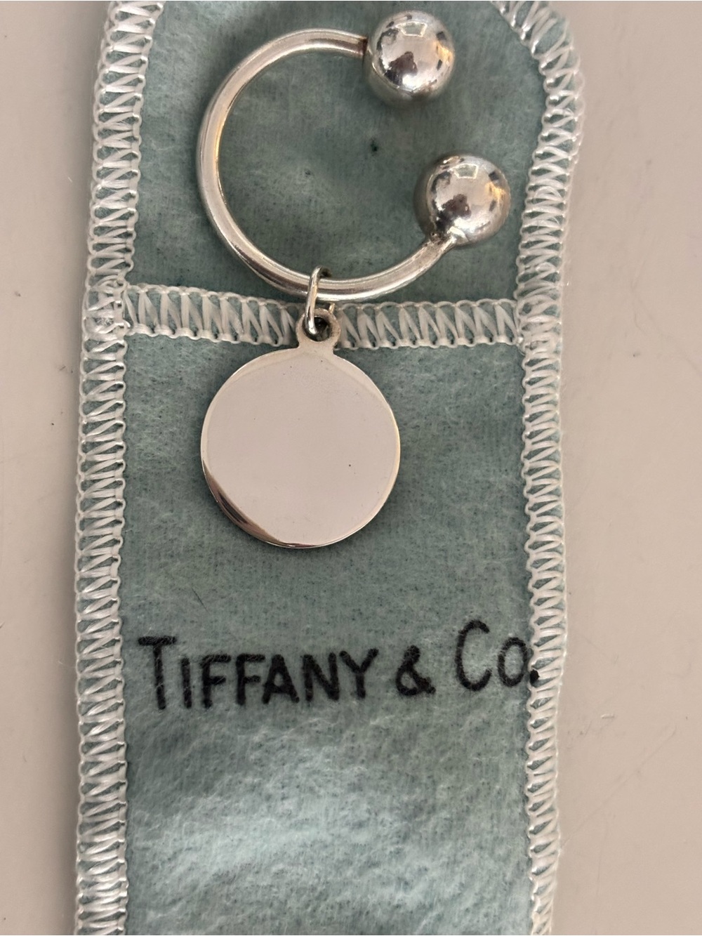 Vintage Tiffany & Co. and Makers Sterling Round Tag Screwball Key Ring